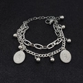 Detail van zilveren dubbellaagse roestvrijstalen armband met kruisjes en kralen - Maagd Maria Ovale Plaatstijl / 18+5cm