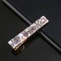 Detail of rectangular acrylic hair clip with grey marble pattern on gold metal base - Grey Marble Pattern