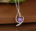 Macro detail of silver necklace featuring a purple zircon gemstone and flowing design - Purple Zirconia Pendant Only (Without Chain)