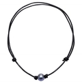 Detailed view of large dark grey pearl fixed with knots on a black leather neck cord - Double Cord Necklace / Dark Gray