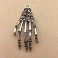 Retro silver skeleton hand pendant with skull bone details for Halloween jewelry DIY - Antique Skeleton Hand 19x42mm
