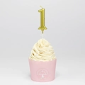 Elegant gold number 1 birthday candle with pearlescent finish on a cupcake - Number 1