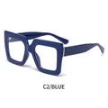 Retro oversized square blue eyeglasses frame with gold metal accents and blue block lens - Solid Blue Frame