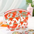 Close-up of semi-circle transparent PVC makeup bag with red watermelon print and red zipper - Watermelon red
