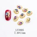 Detailed macro view of K9 alloy nail charms with colorful crystals and pearls - Japanese Style Oval Nail Charm (2805) / 10 Pieces Pack