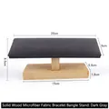 Single layer dark gray microfiber bracelet display stand with solid wood base - Flat Bracelet Stand: Dark Grey Microfiber