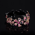Floral rhinestone hair clip with pink blue and gold crystals on a black base - Large Flower Colorful / Large