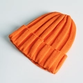 Vibrant orange ribbed knit beanie for kids and adults with classic folded cuff design - One Size / Orange