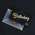 Elegant black birthday card with gold foil lettering and a semi-transparent envelope - Style B-Happy Birthday Cake