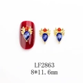 Detalle de adorno para uñas con cabeza de ciervo dorada y cristales azules y rojos - Base Dorada Piedra Principal de Gota de Agua Azul (2863)
