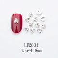 Silver paw print nail charm with white rhinestones on red nail, size 4.6x4.8mm - Silver Paw Print Style (LF2831)