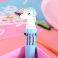 Blue multi-color retractable ballpoint pen with a cute white unicorn topper design - Blue Unicorn
