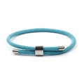 Macro detail of sky blue braided Milan rope bracelet with adjustable steel slider - Sky Blue