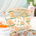 Detail of waterproof PVC makeup bag with cute watermelon print and secure metal zipper - Orange