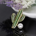 Elegant gold cactus brooch with green enamel, white crystals and a round pearl detail - Green Cactus Pearl