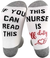 Detail of cotton socks with IF YOU CAN READ THIS NURSE IS OFF DUTY print and stethoscope - Nurse Theme