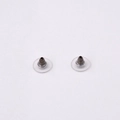 Close-up of universal silicone and metal earring back stoppers with clear disk pad - Silver Metal + Clear Large Disk Backs