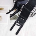 Detail of soft black cat pattern scarf draped from a wire basket on white fabric - Black Cat / 120cm
