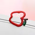 Cute red apple-shaped hair clip with green leaf detail on white display card - Red Apple