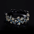 Elegant black circular hair clip with silver and blue rhinestone flower details - Large Flower Blue Grey / Large