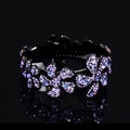 Sparkling purple crystal hair bun maker with rhinestone floral design on black base - Large Flower Purple Blue