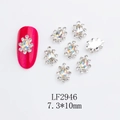 Silver crown-shaped nail art charms with K9 rhinestones and red manicure display - Waterdrop-LF2946 / Silver/Opal