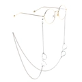 Silver eyewear chain with gold mini glasses pendant on white background - Silver