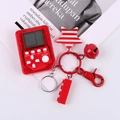 Portachiavi mini console di gioco Tetris rosso trasparente con ciondoli a stella e campanella - Rosso