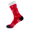 Detalle de calcetín navideño rojo con copos blancos y talón negro de algodón suave - Copo de nieve
