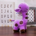 Purple giraffe plush toy with brown spots and suction cup hanger on wooden surface - Purple / 25cm