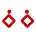 Detailed view of handmade red beaded geometric diamond earrings with intricate textures - Red