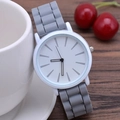Minimalist quartz watch featuring a white case and a stylish grey silicone strap - Gray