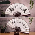 Classic Chinese folding fan with calligraphy, red wood ribs and black display stand - 10 Inch Diligence Pays Off