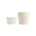 Close-up of white greaseproof muffin liners showing stacked design and pleated paper texture - White