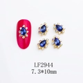 Detail of LF2944 crown nail charms with blue teardrop stones and 7.3x10mm size - Waterdrop-LF2944 / Gold/Blue