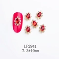 Detail of teardrop red jewel nail charms with silver rhinestones on pink nails - Waterdrop-LF2941 / Gold/Red