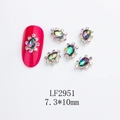 Close-up of teardrop-shaped alloy nail charms with K9 crystals in 7.3x10mm size - Waterdrop-LF2951 / Silver/Clear