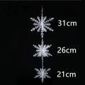 Vertical white snowflake string decoration with sizes 31cm, 26cm, and 21cm for Christmas - Snowflake String (31/26/21cm)