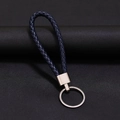 Portachiavi in pelle intrecciata blu scuro con chiusura e anello in metallo lucido - 30*1.6mm / Blu Notte