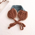 Detail view of knitted earmuff scarf set with brown cable knit and plush lining - Caramel + Sky Blue