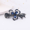 Barrette vintage argentée avec strass bleu foncé et design floral élégant en nœud - Trèfle Bleu Marine Petit 6.8cm