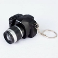 Mini SLR camera keychain in black and silver with LED light and sound effect - Black