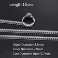 Detail eines 4,8 mm transparenten Spiral-Ringverkleinerers zur sicheren Größenanpassung - Dick Flach [4 Stück/Packung]