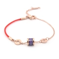 Bracciale in corda rossa e catena oro rosa con cilindro rotante in gemma viola - Viola