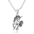 Retro silver unicorn pendant necklace with delicate floral patterns and metallic finish - Unicorn / Silver