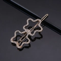 Detail einer goldenen Stern-Haarklammer mit weißen Strasssteinen auf schwarzem Grund - Gold Zwei Pflaumenblüten Frosch Clip