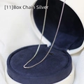 Macro shot of silver box chain necklace details on blue velvet jewelry display case - Box Chain / 45 cm / Silver