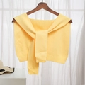 Knitted shawl wrap in bright yellow finish with ribbed hem on wooden hanger - Creamy Yellow