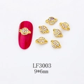 Detailed close-up of golden Saturn-shaped nail art charms with colorful rhinestones - Gold AB Planet Style (LF3003)