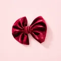 Soft burgundy velvet scalloped bow hair clip for children on a pastel pink background - Dark Red